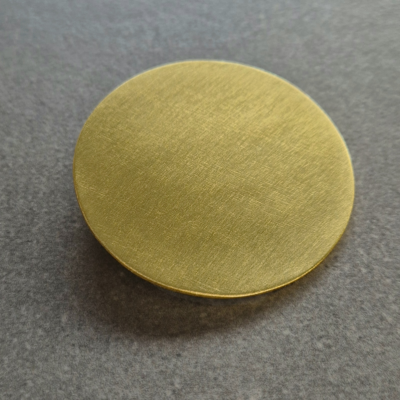 Duża okrągła broszka